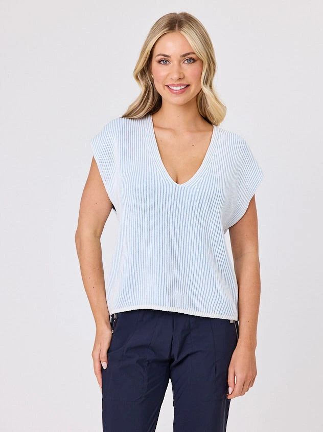 Woman standing front-on in studio light wearing white cotton ribbed top, by Navy & Co nz fashion brand 