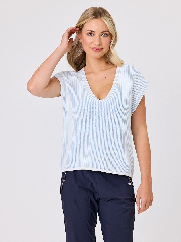 Woman standing front-on in studio light wearing white cotton ribbed top, by Navy & Co nz fashion brand 